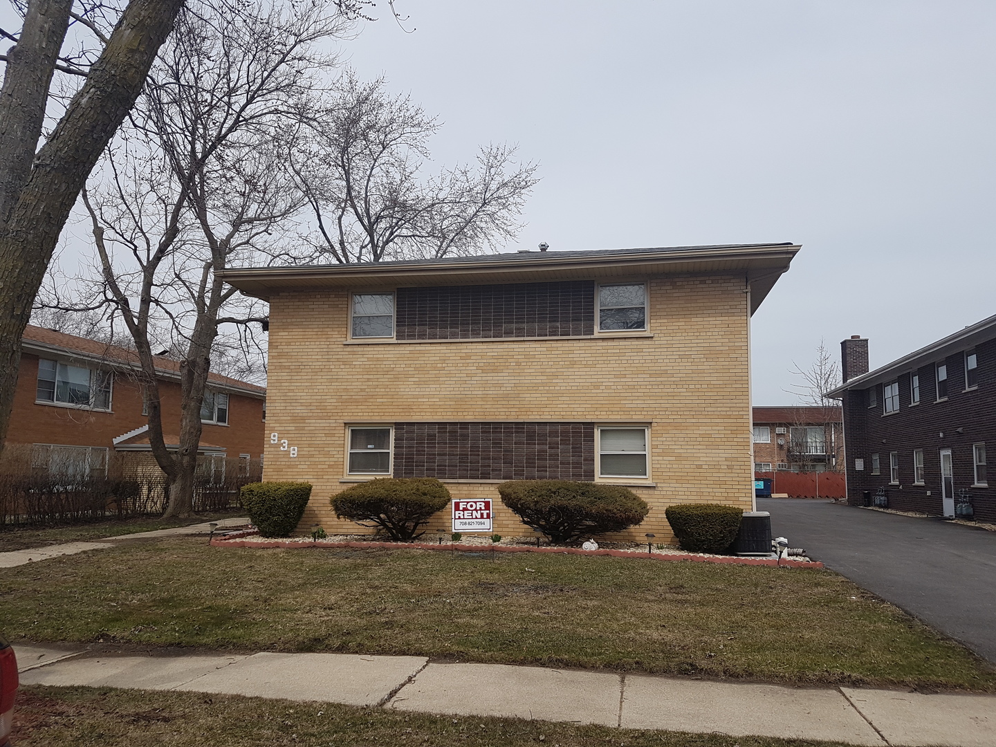 938 Elder Road Homewood, IL 60430 - Photo 1 of 8 a front view of a house with garden