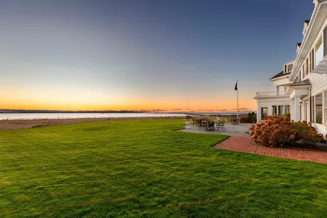 a view of a lake with a big yard