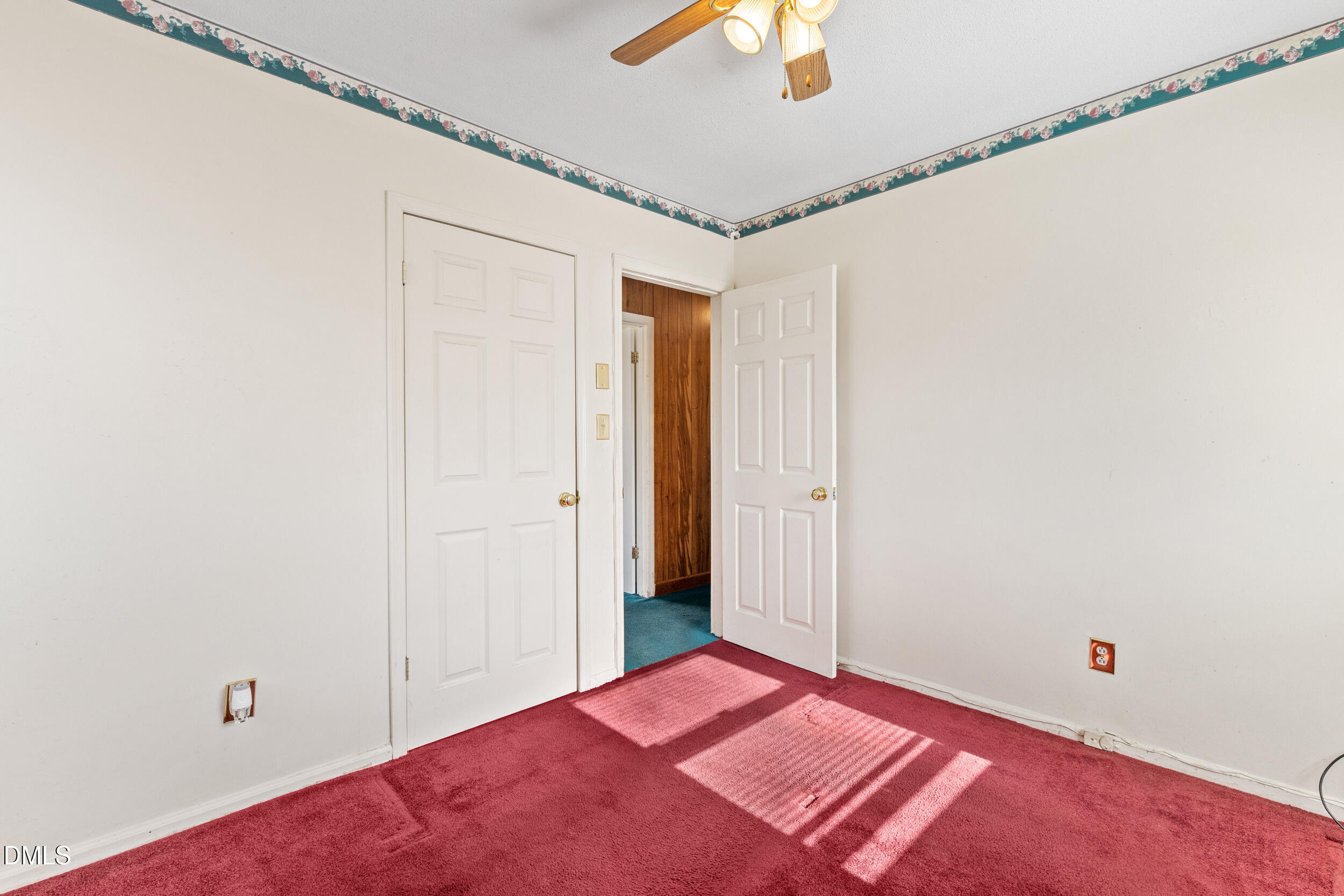 159 Hazel Drive Burlington, NC 27217 - Photo 16 of 21 a bedroom with a bed and a chandelier fan