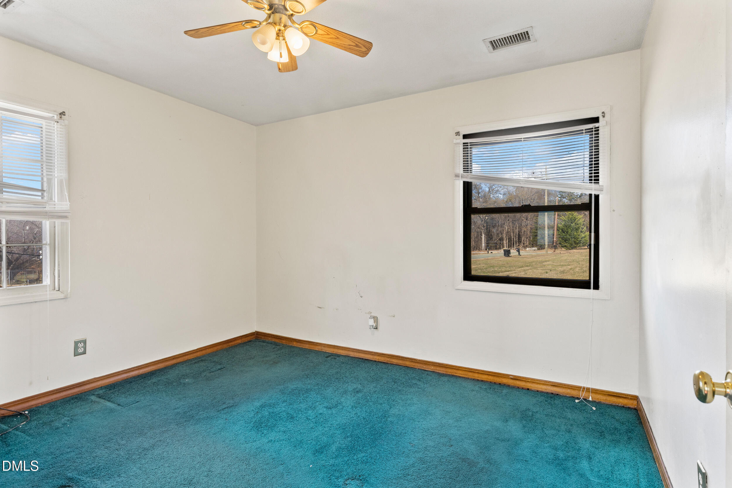 159 Hazel Drive Burlington, NC 27217 - Photo 17 of 21 a view of an empty room with a window
