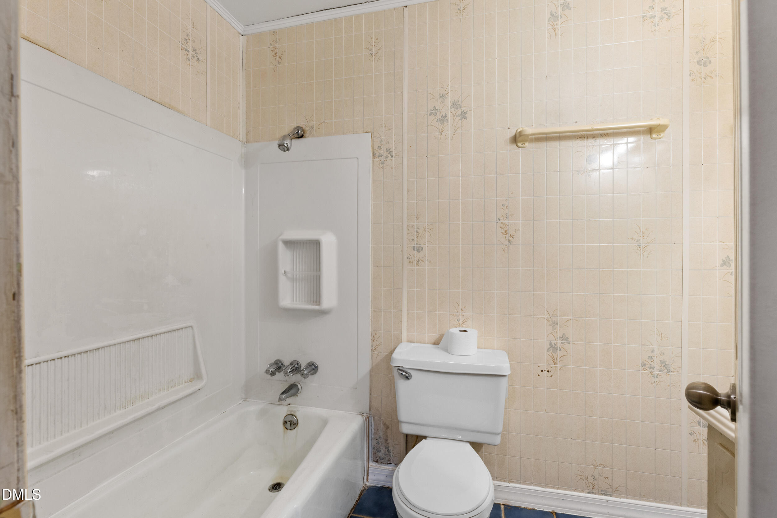 159 Hazel Drive Burlington, NC 27217 - Photo 21 of 21 a white toilet sitting next to a bath tub