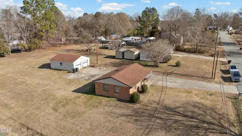 a view of a backyard with a fountain and a mountain