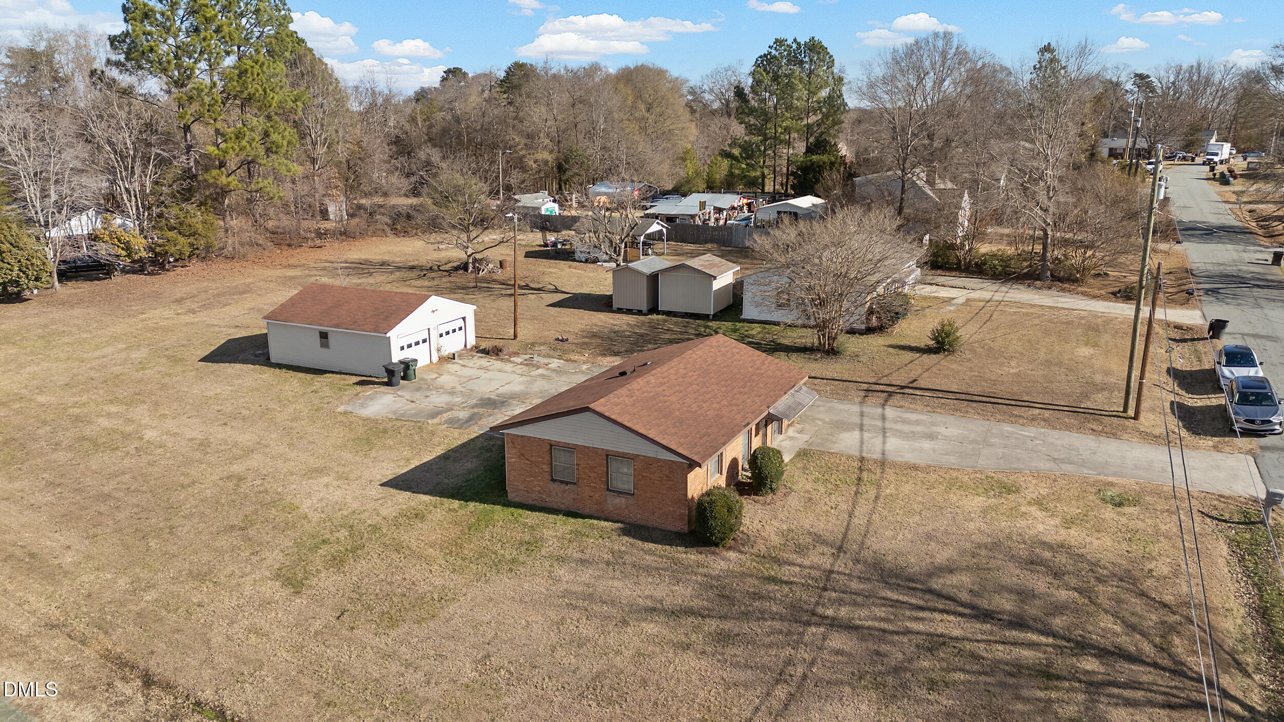 159 Hazel Drive Burlington, NC 27217 - Photo 8 of 21 a view of a backyard with a fountain and a mountain