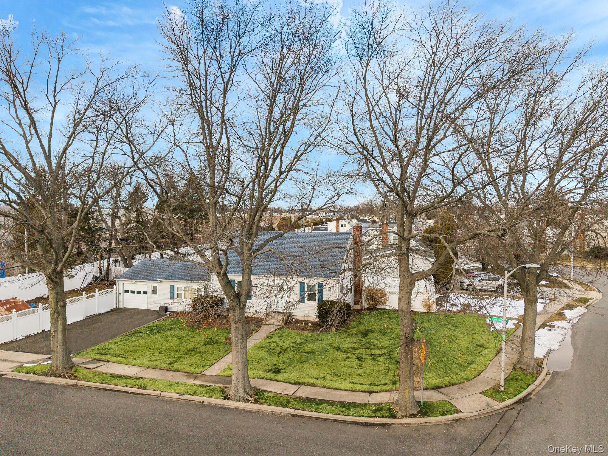 3683 Hawk Road Levittown, NY 11756 - Photo 27 of 41 a view of outdoor space and trees