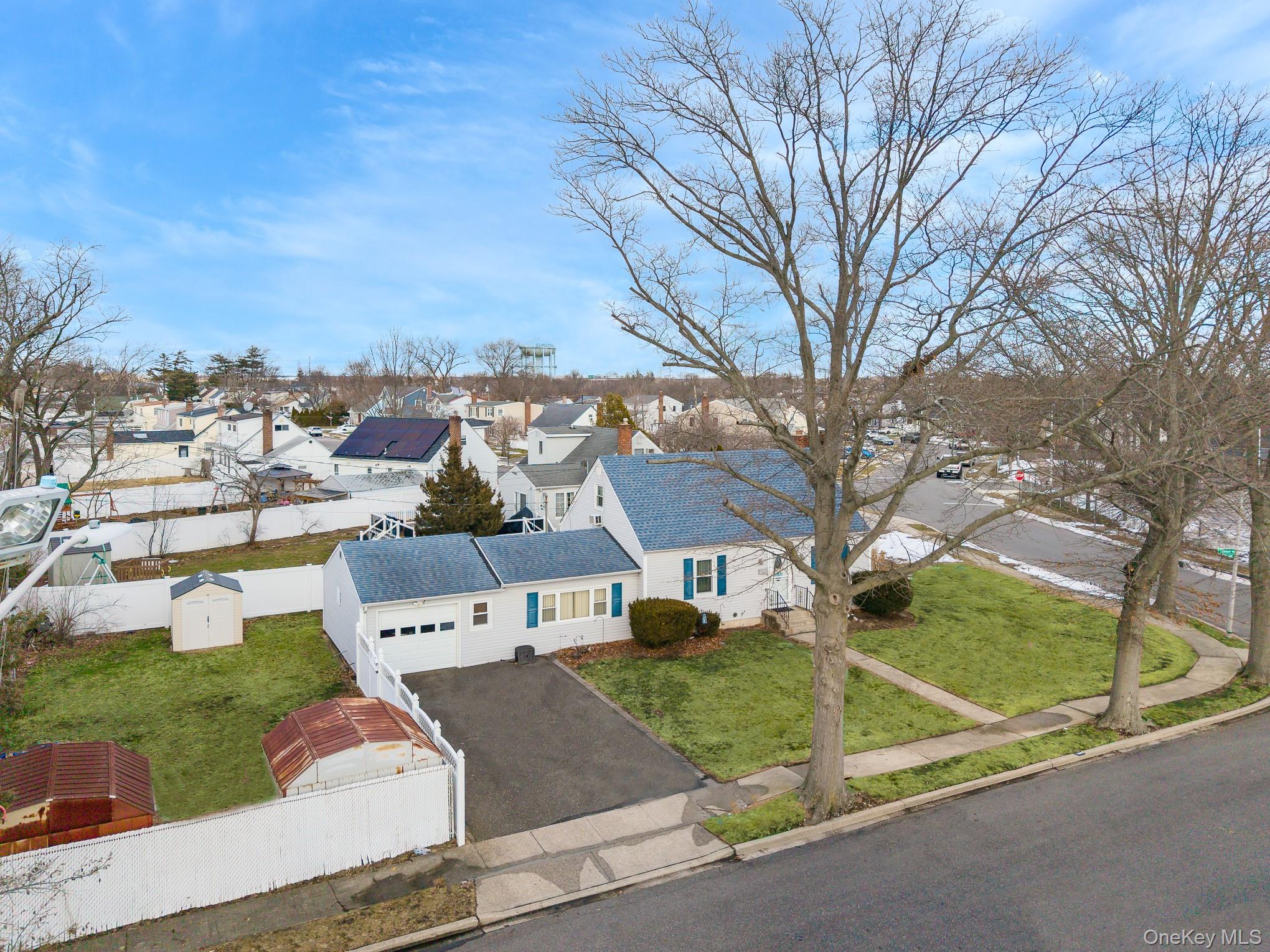 3683 Hawk Road Levittown, NY 11756 - Photo 28 of 41 an aerial view of residential houses with yard