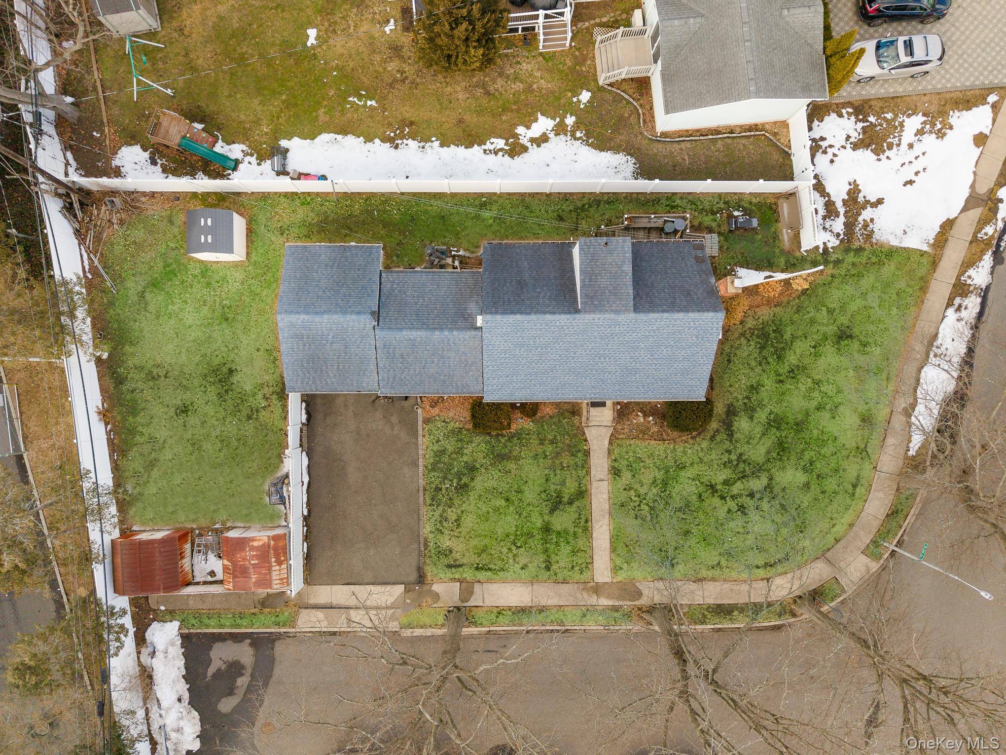 3683 Hawk Road Levittown, NY 11756 - Photo 36 of 41 an aerial view of a house with a yard