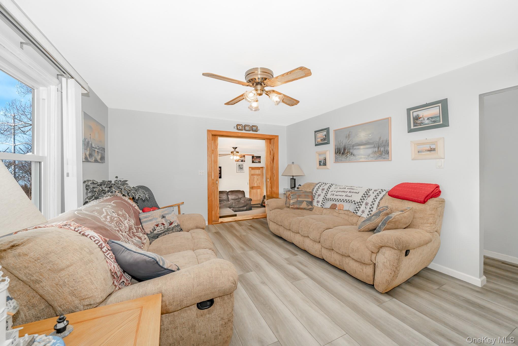 3683 Hawk Road Levittown, NY 11756 - Photo 10 of 41 a bedroom with furniture and a large window