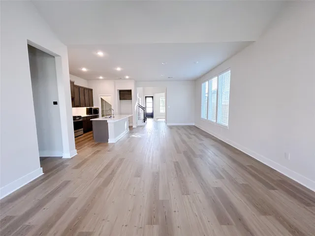 a bathroom with a bath tub and shower