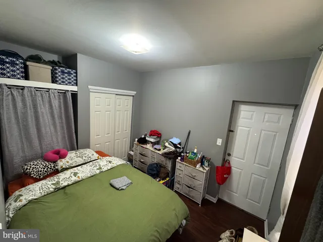 a room with toys and a wooden floor