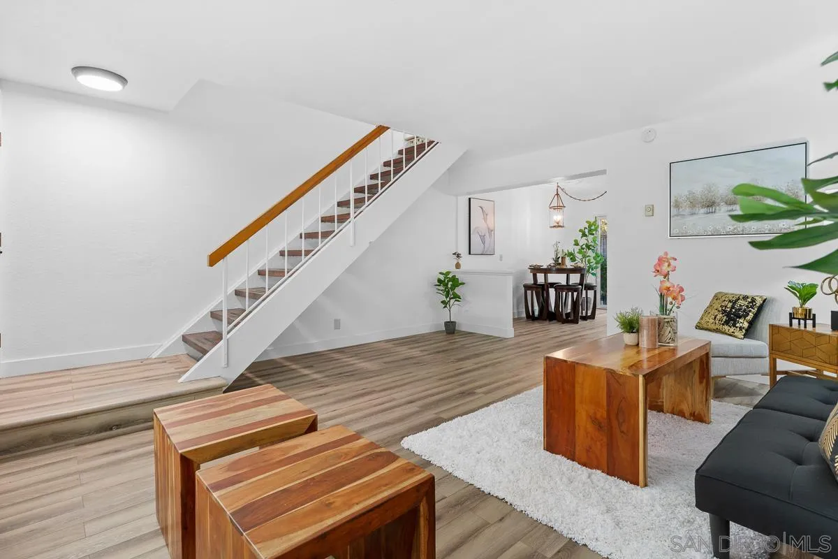 981 North Vulcan Avenue, Unit 4 Encinitas, CA 92024 - Photo 4 of 24 a living room with furniture and wooden floor