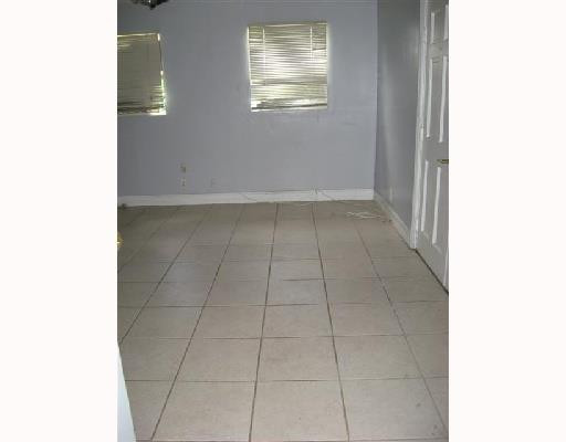 6301 Southwest 3rd Street Pompano Beach, FL 33068 - Photo 11 of 13 a view of an empty room with windows