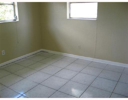 6301 Southwest 3rd Street Pompano Beach, FL 33068 - Photo 10 of 13 a view of a room that has a window in it