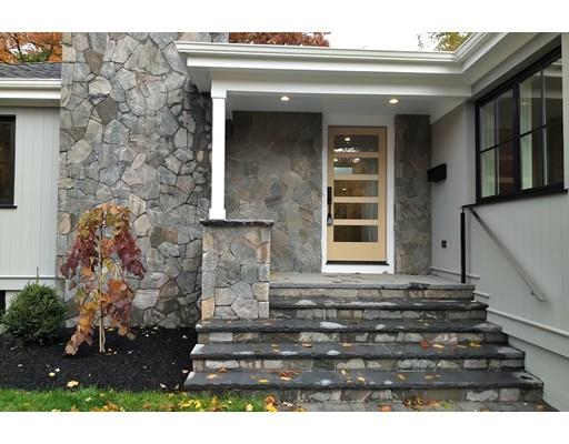 60 Woodcliff Road Brookline, MA 02467 - Photo 26 of 30 a front view of a house with a garden