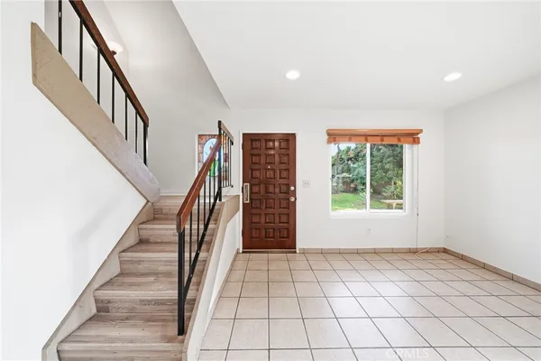 a view of an entryway with staircase