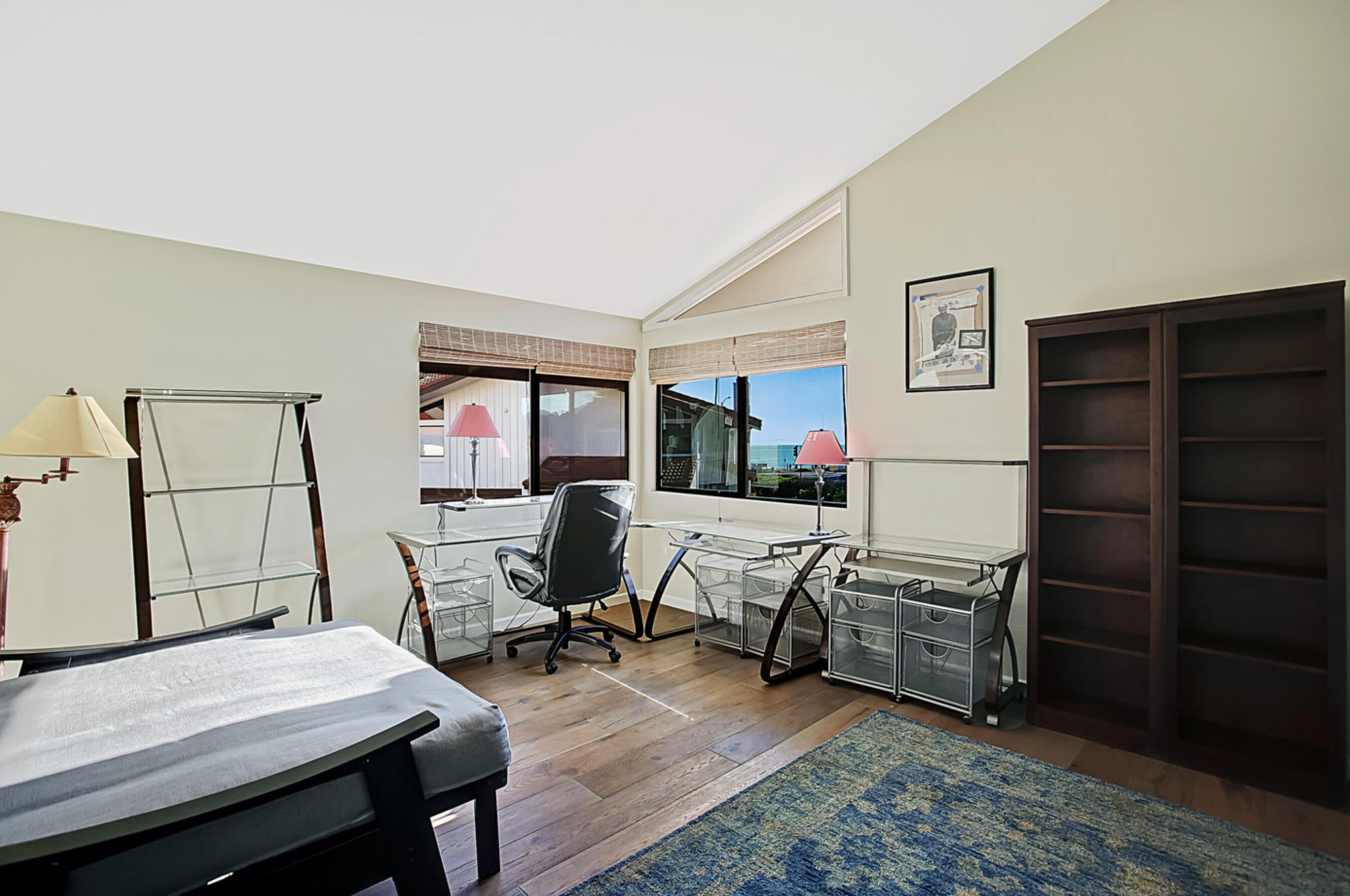 669 Del Parque Drive, Unit D Santa Barbara, CA 93103 - Photo 13 of 37 a workspace with furniture and wooden floor