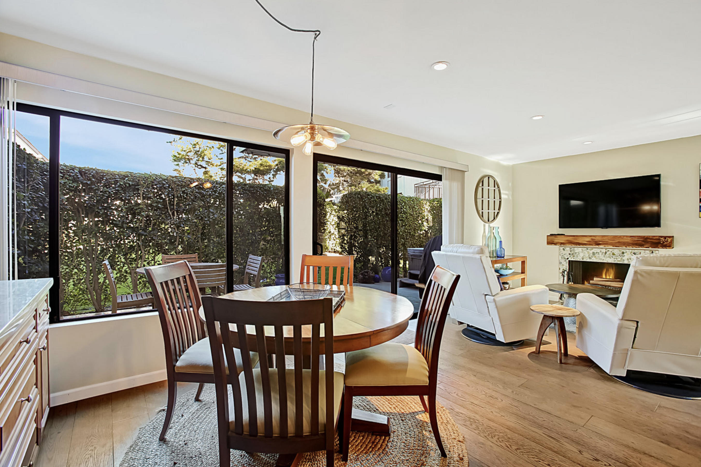 669 Del Parque Drive, Unit D Santa Barbara, CA 93103 - Photo 4 of 37 a view of a dining room with furniture window and wooden floor