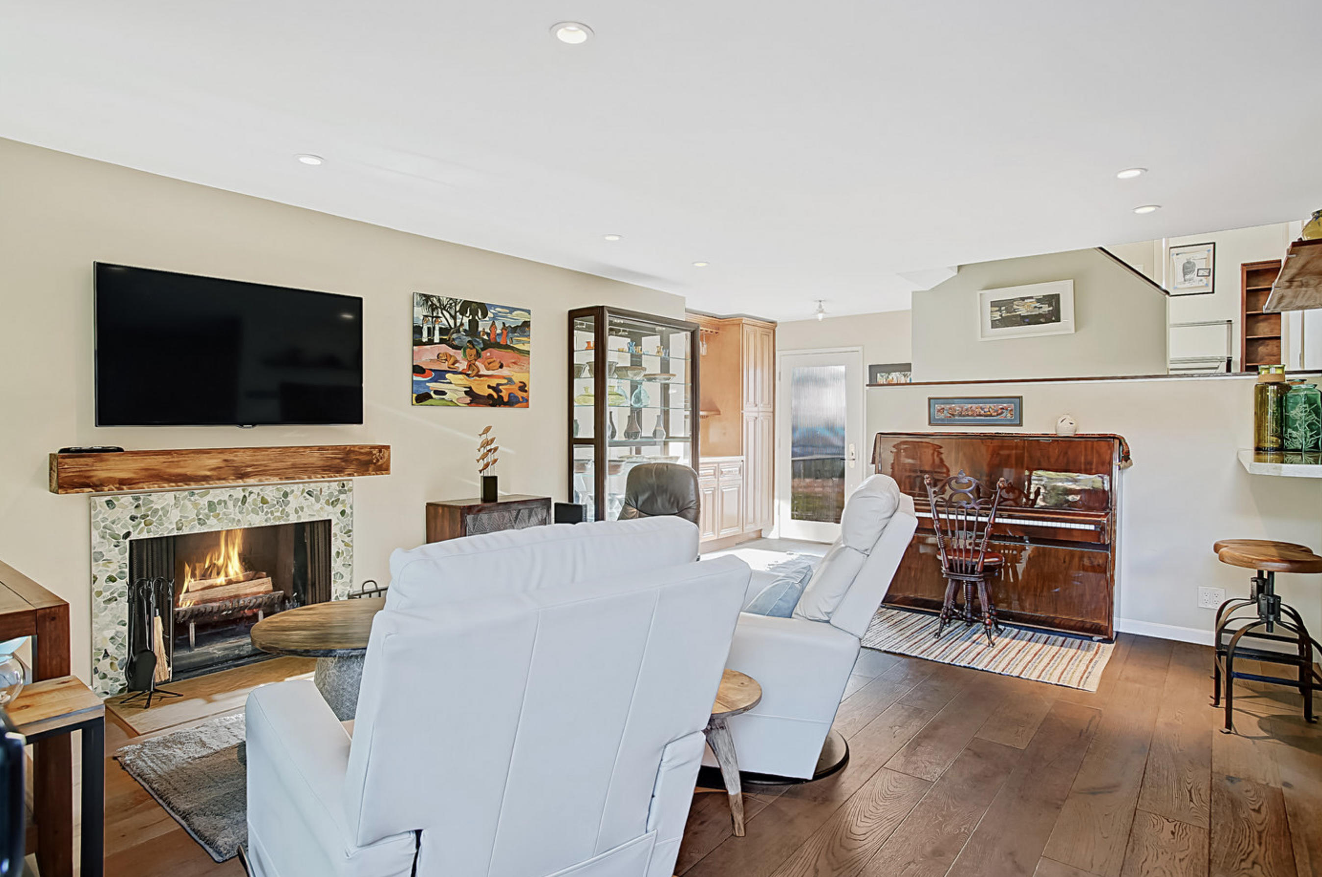 669 Del Parque Drive, Unit D Santa Barbara, CA 93103 - Photo 8 of 37 a living room with furniture and a fireplace