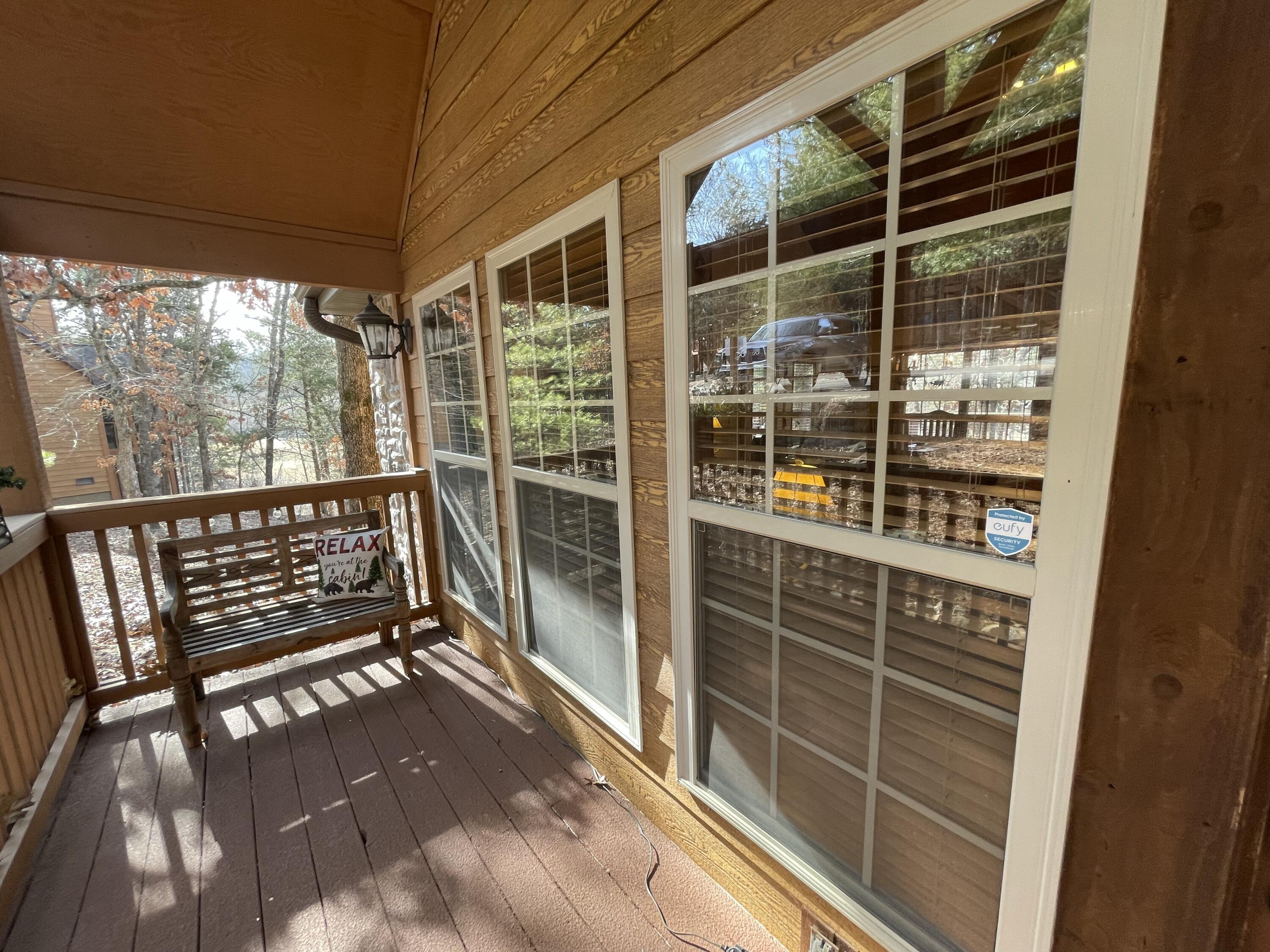 101 Lost Creek Circle, Unit 5 Reeds Spring, MO 65737 - Photo 4 of 46 Cozy Porch Entrance