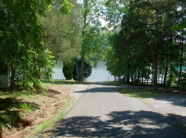 Lot 65 Gap Bridge Road Moneta, VA 24121 - Photo 1 of 5 a view of a yard with plants and trees