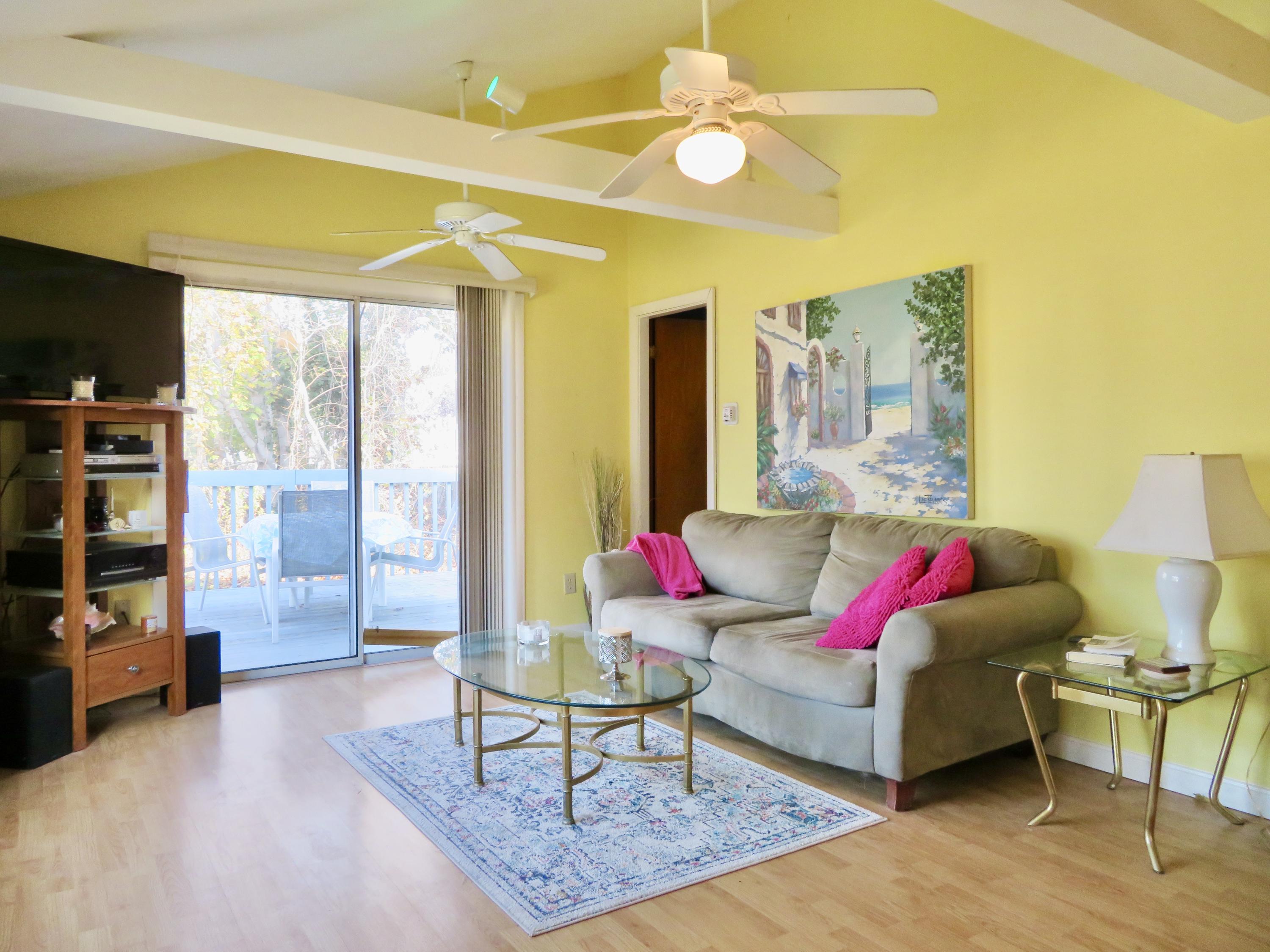 42 Wixon Road Dennis Port, MA 02639 - Photo 4 of 19 Living Room with Slider to Deck