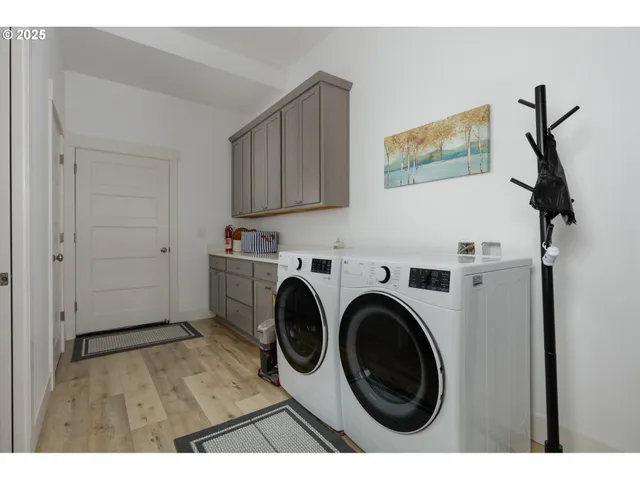 a view of a room with washer and dryer