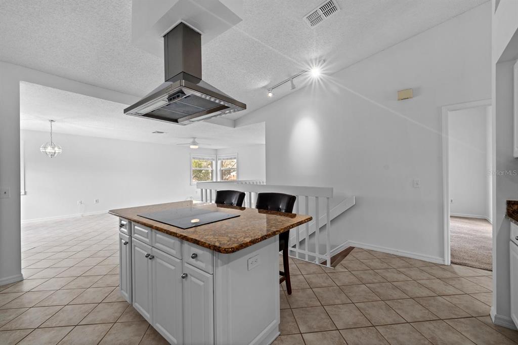 1227 Clays Trail Oldsmar, FL 34677 - Photo 15 of 37 a kitchen with a sink a counter space and appliances