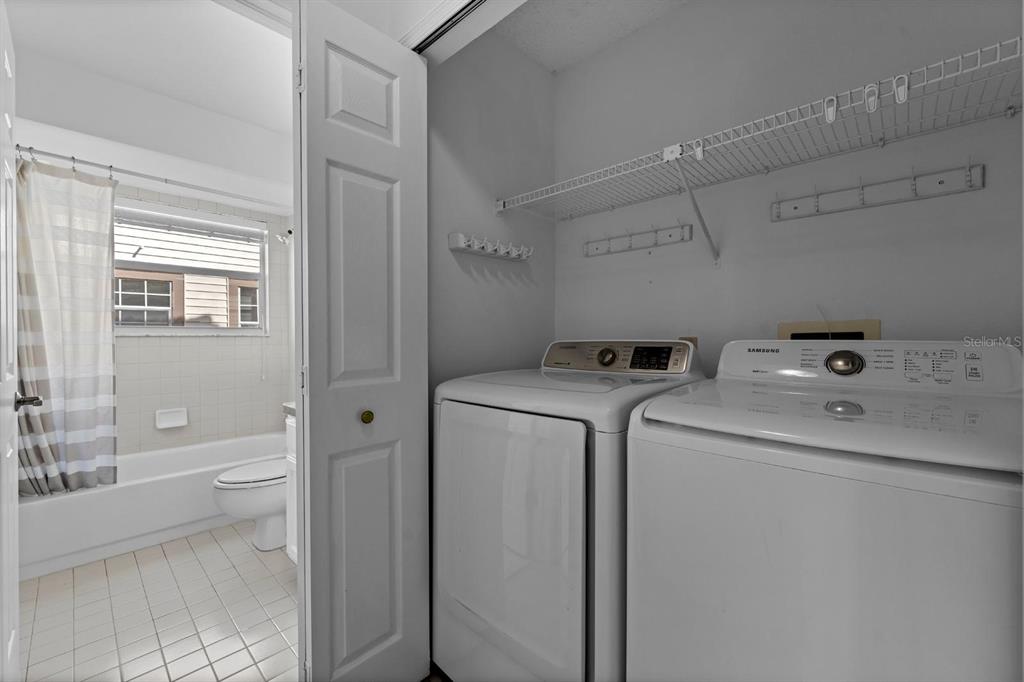 1227 Clays Trail Oldsmar, FL 34677 - Photo 27 of 37 a utility room with dryer and washer