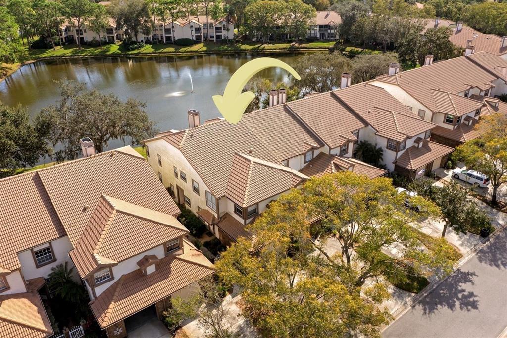 1227 Clays Trail Oldsmar, FL 34677 - Photo 3 of 37 an aerial view of a house with a lake view