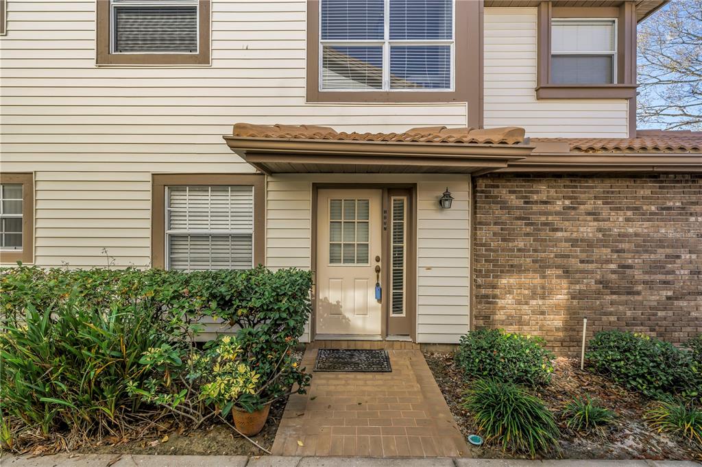 1227 Clays Trail Oldsmar, FL 34677 - Photo 36 of 37 a front view of a house with garden