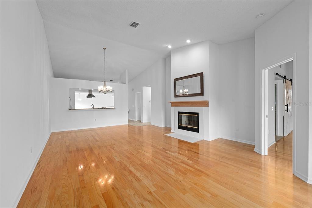 1227 Clays Trail Oldsmar, FL 34677 - Photo 4 of 37 a view of a livingroom with a fireplace