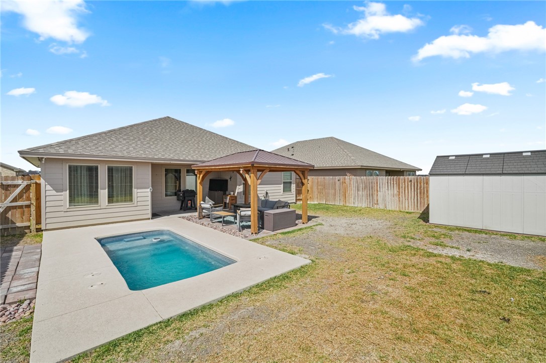 103 Donegal Street Sinton, TX 78387 - Photo 24 of 29 a front view of a house with yard patio and outdoor seating
