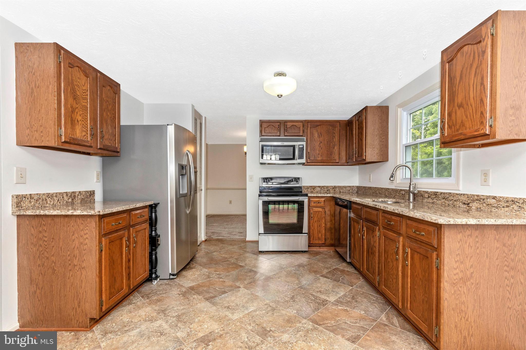 588 Pumphouse Road Frederick, MD 21703 - Photo 11 of 58 Roomy Kitchen with Stainless Appliances