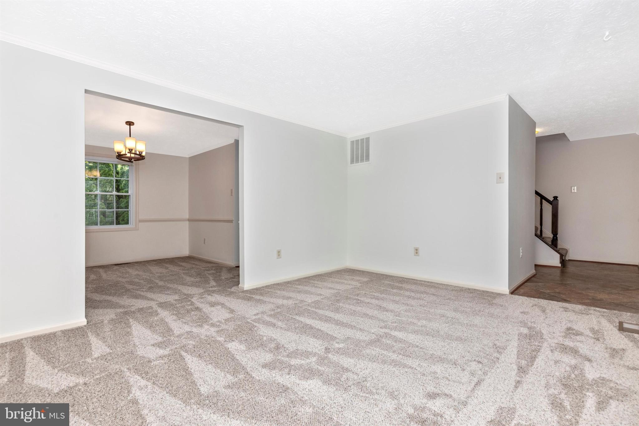 588 Pumphouse Road Frederick, MD 21703 - Photo 8 of 58 Spacious Living Room w/ Steps leading to 2nd Floor