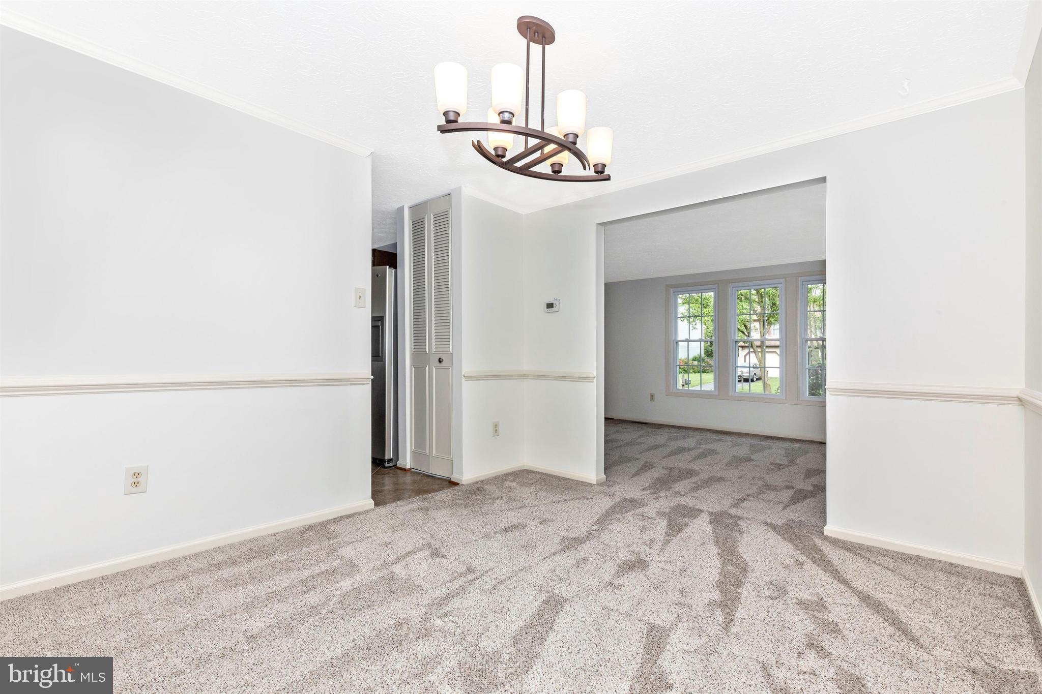 588 Pumphouse Road Frederick, MD 21703 - Photo 10 of 58 Dining Room w/ W to W carpet and new light fixture
