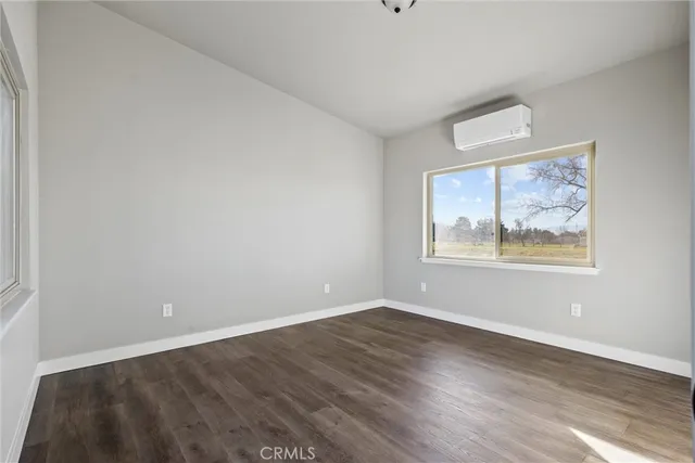 an aerial view of a house with a lake view