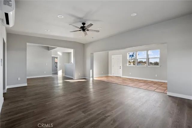 a view of an empty room and window