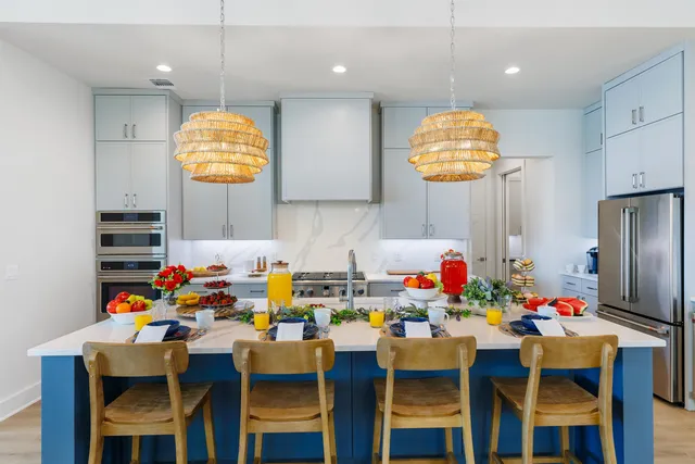 a view of a dining room and kitchen island