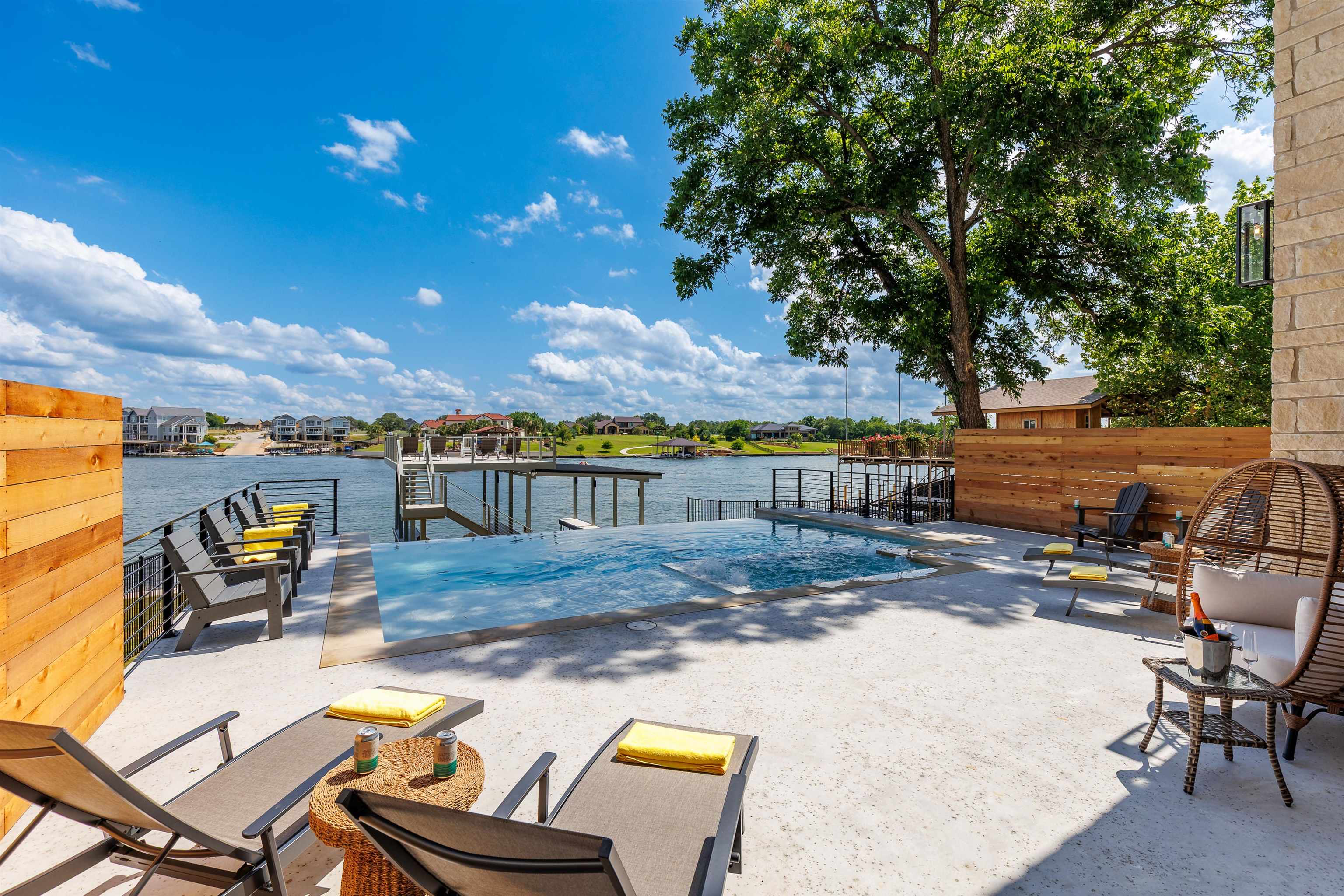 563 Ellen Williams Loop Kingsland, TX 78639 - Photo 2 of 30 Vanishing Pool with Awe-inspiring Lake Views.