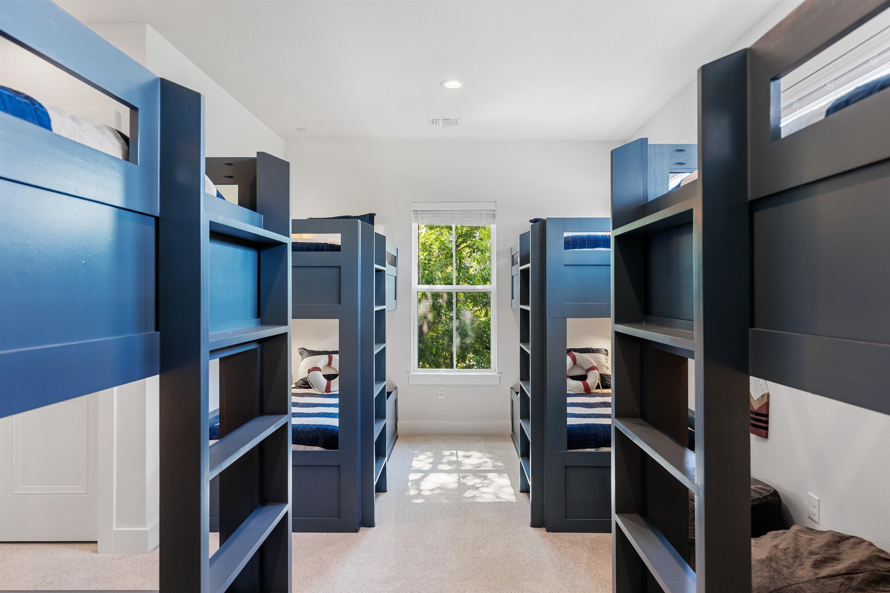 563 Ellen Williams Loop Kingsland, TX 78639 - Photo 26 of 30 Bedroom 5 has 4 Twin Bunk Beds (Sleeps 8) | Walk-in Closet | 65" Samsung Smart