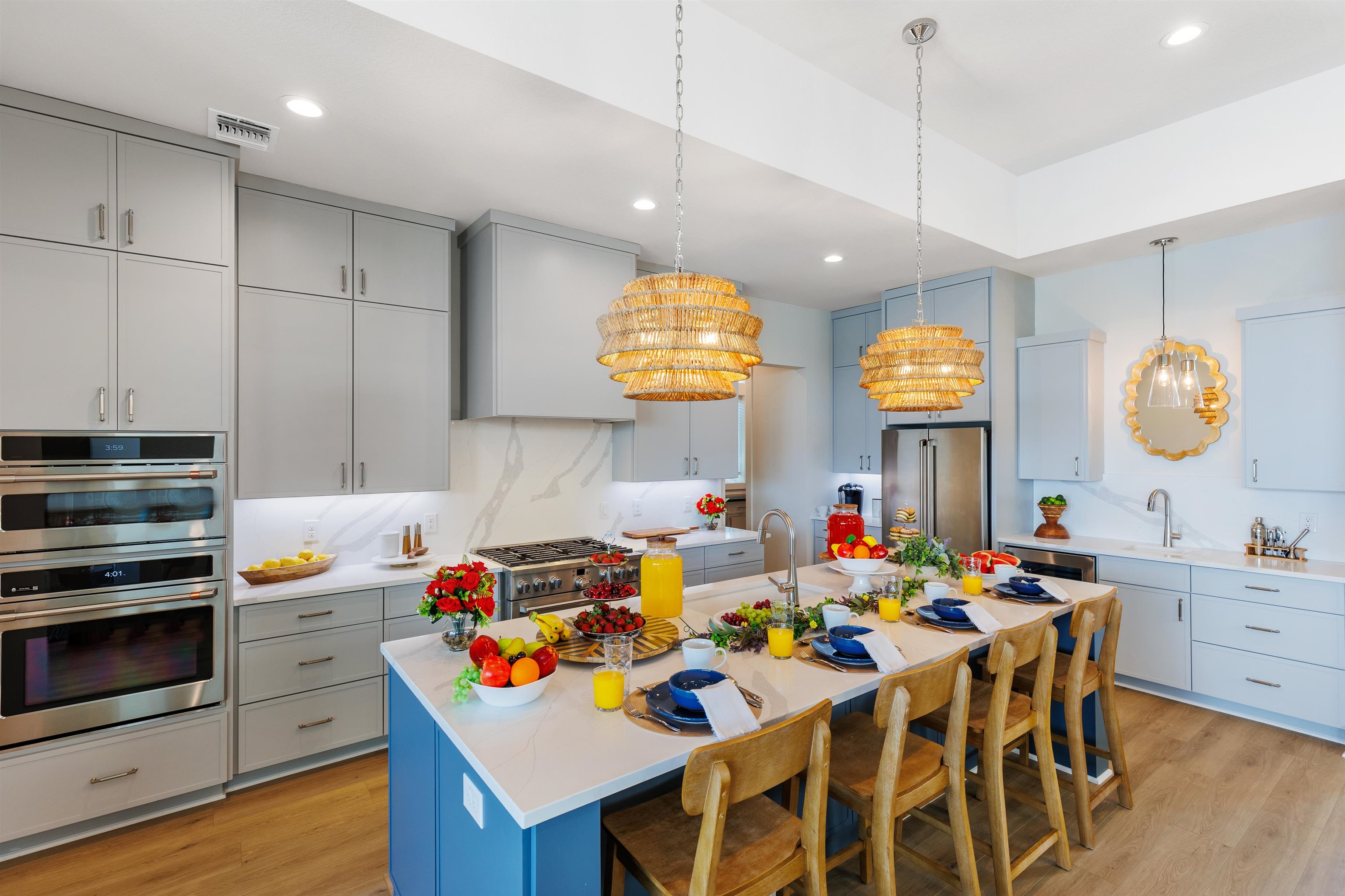 563 Ellen Williams Loop Kingsland, TX 78639 - Photo 9 of 30 Kitchen featuring MSI Calacatta Leon Quartz counters & GE Café stainless appliances.