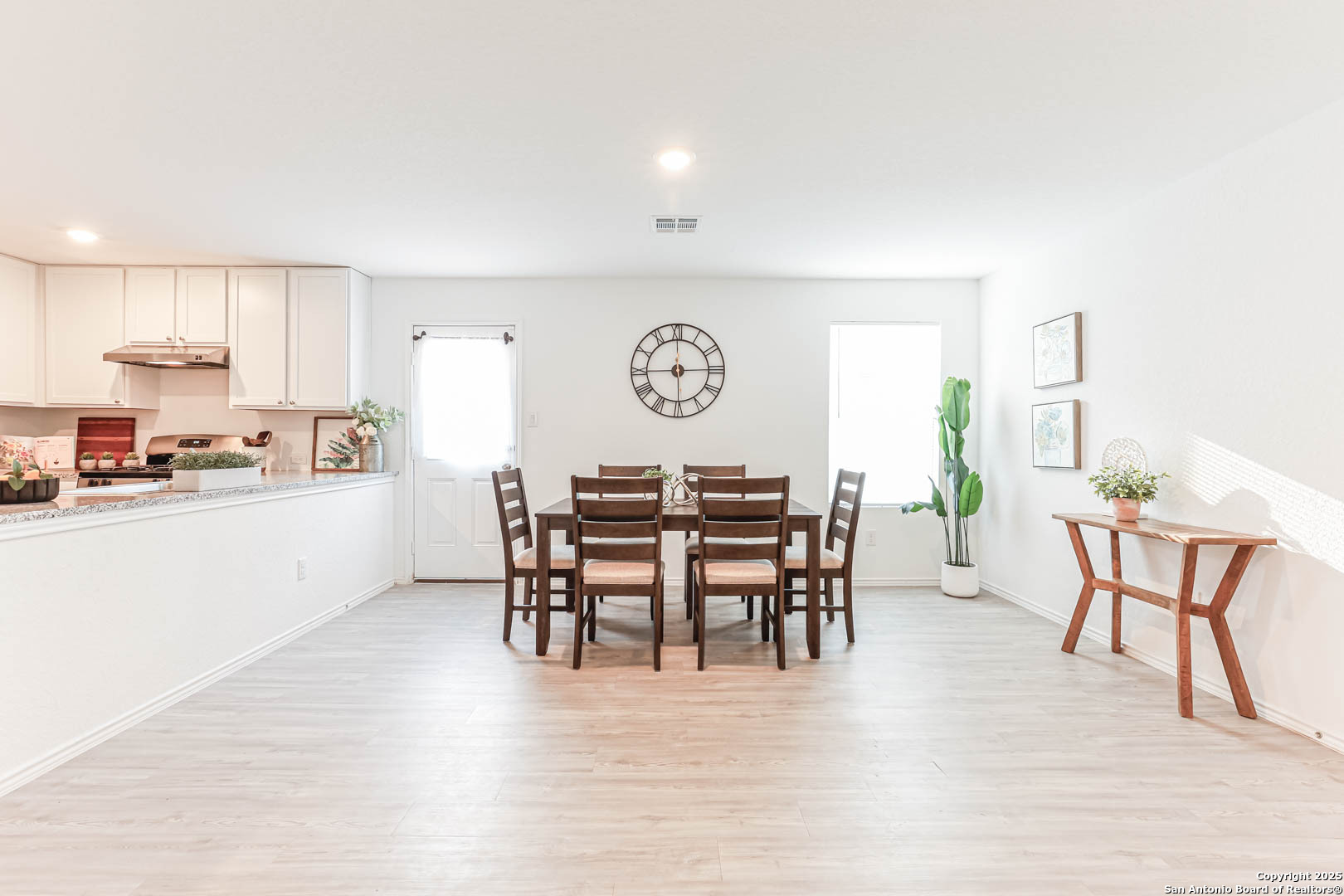 5935 Texas Seguin, TX 78155 - Photo 12 of 20 a view of a dining room with furniture and chandelier