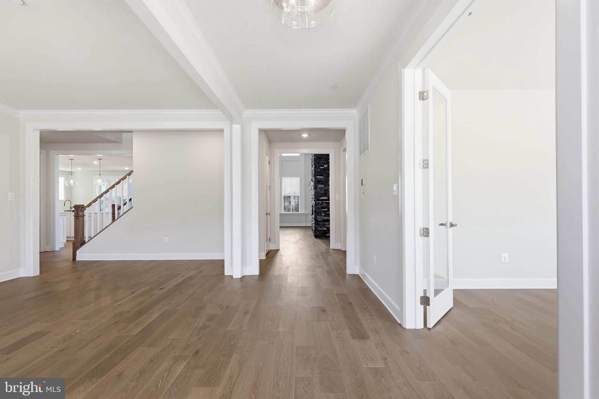 233 Coffman Drive Exton, PA 19341 - Photo 17 of 55 a view of a hallway with wooden floor