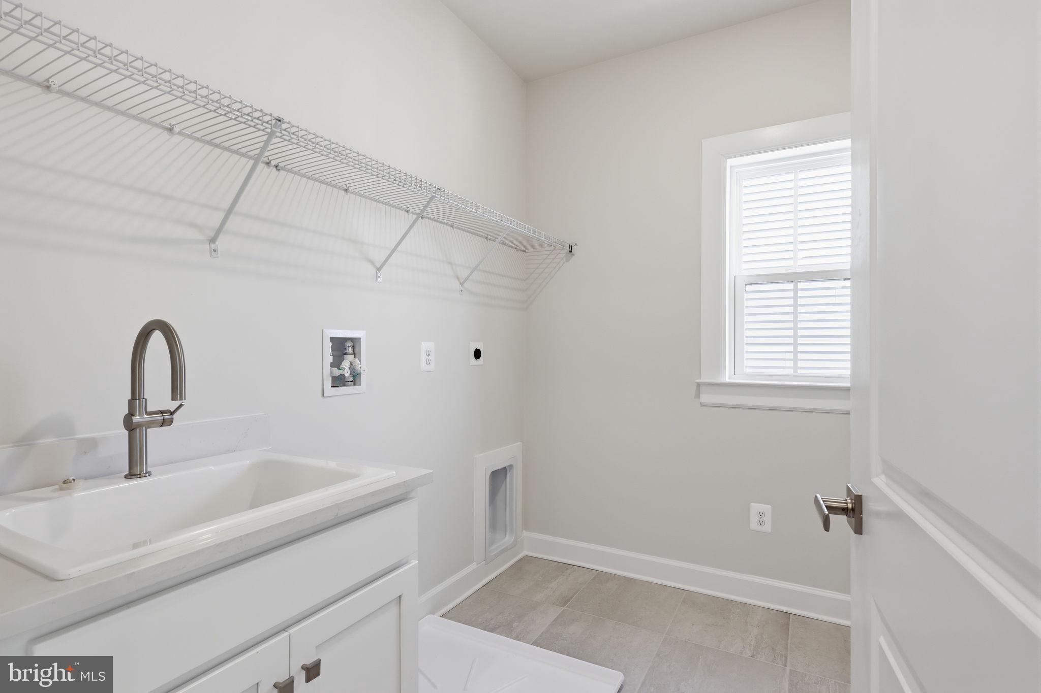 233 Coffman Drive Exton, PA 19341 - Photo 28 of 55 a bathroom with a sink and vanity
