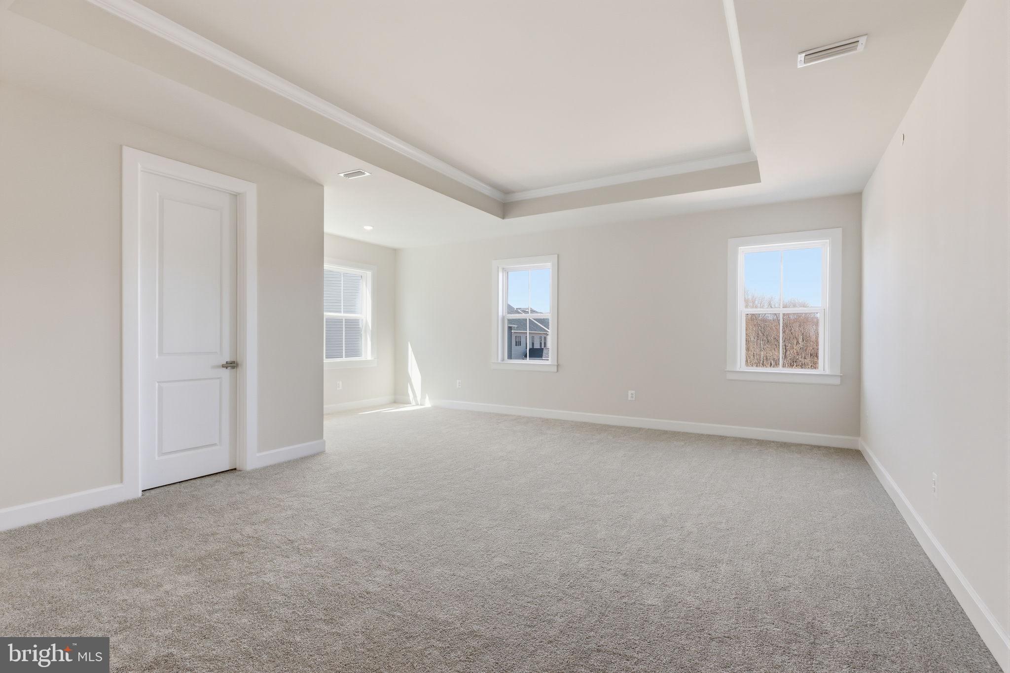 233 Coffman Drive Exton, PA 19341 - Photo 29 of 55 a view of empty room with windows