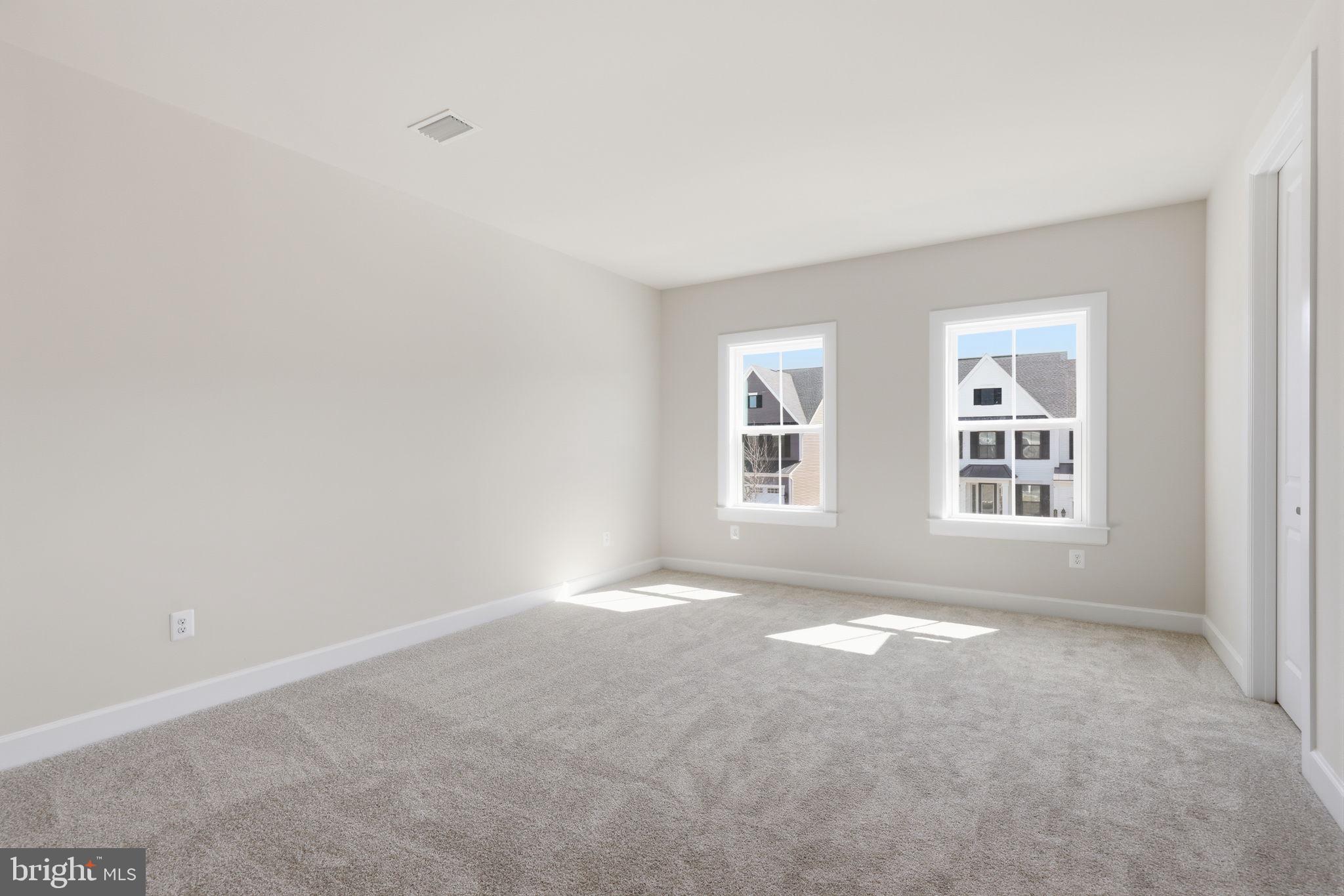 233 Coffman Drive Exton, PA 19341 - Photo 36 of 55 an empty room with windows