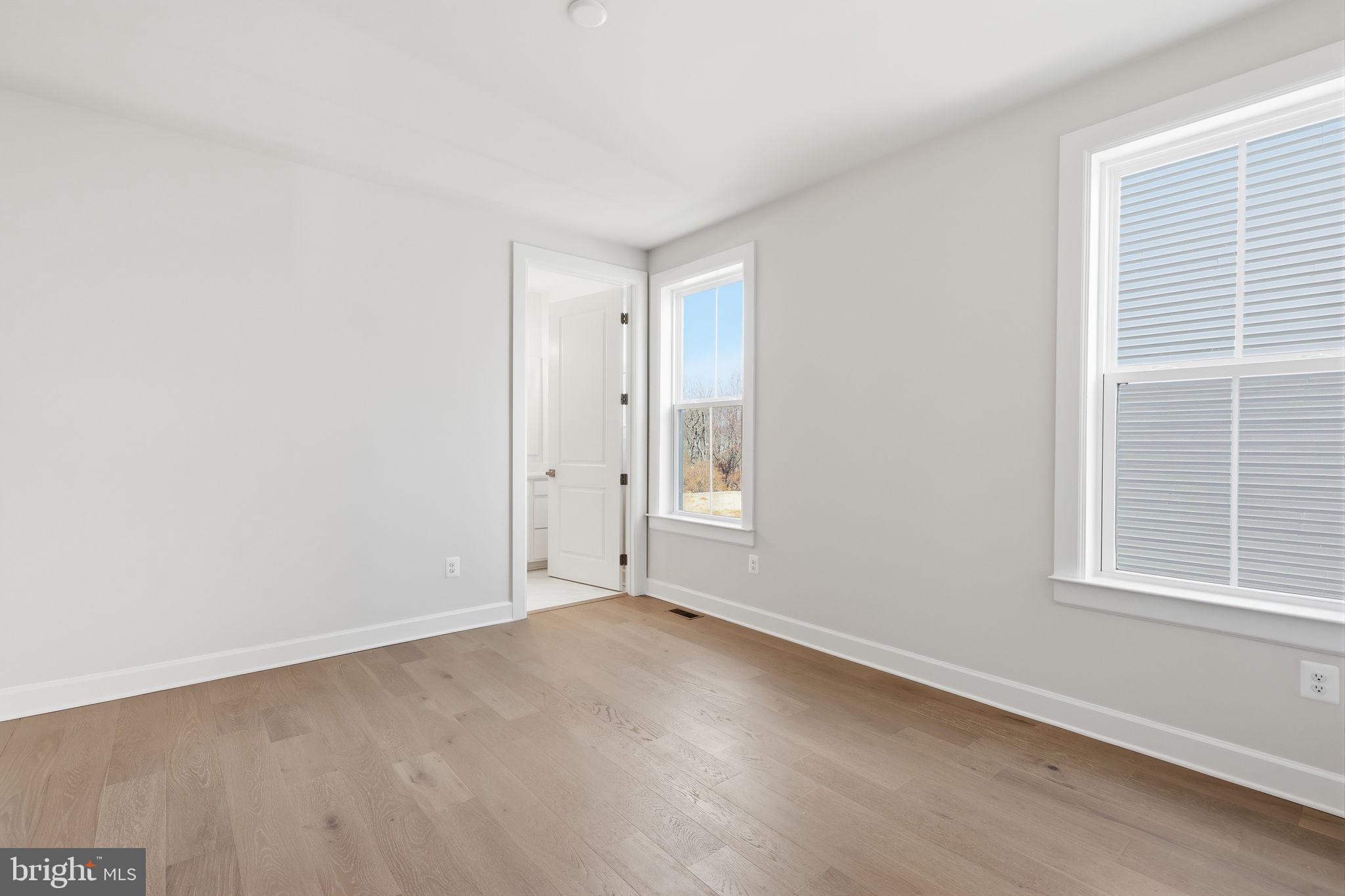 233 Coffman Drive Exton, PA 19341 - Photo 10 of 55 an empty room with a window
