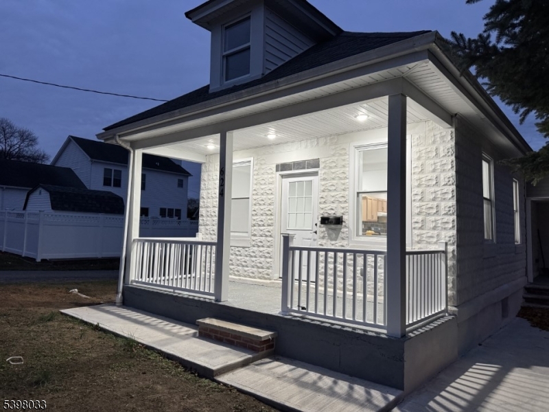 a view of a house with a porch