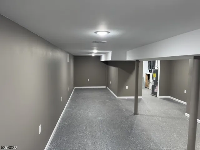 wooden floor in a hall with wooden cabinet