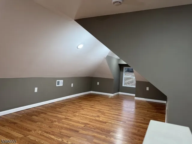 a kitchen with a stove top oven and cabinets