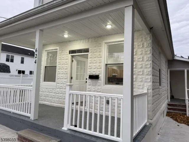 a view of wooden floor and staircase